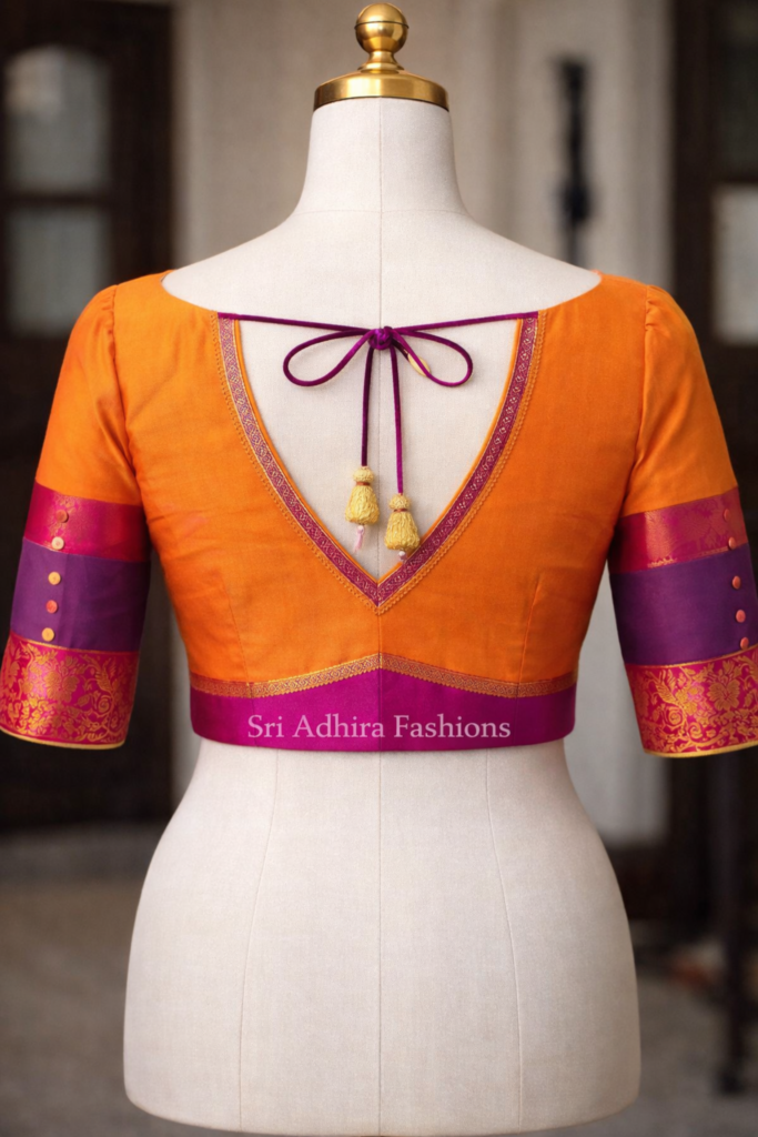 V back tie-up blouse with tassels on mannequin featuring contrast sleeves and custom tailoring design